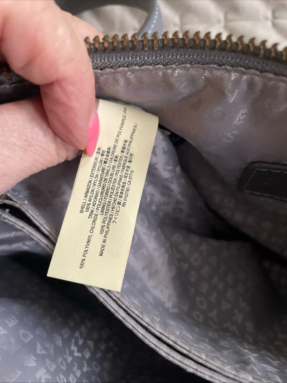 kate spade gray nylon crossbody with gold logo plaque